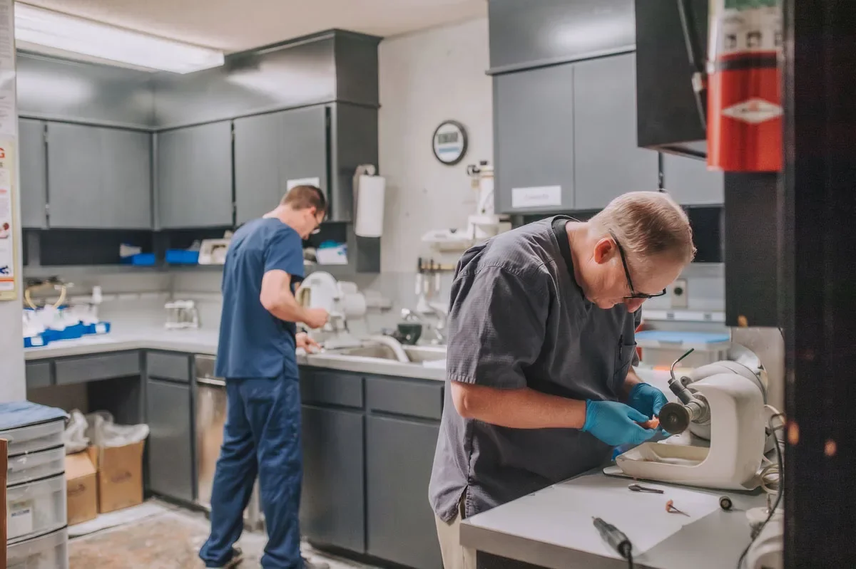 Professional Denture Clinic technicians at work in the in-house lab